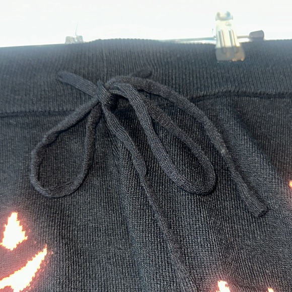 Beach Riot glow in the dark Halloween themed shorts. Size M in color black. - Picture 3 of 3